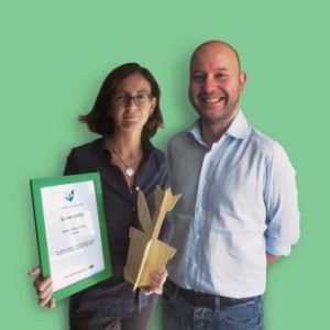 Carlotta Priola (Sustainability Manager Burgo Group) and Raffaele Marinucci (Genral Manager Verzuolo mill) holding the IKEA Tulip Award and Certificate.